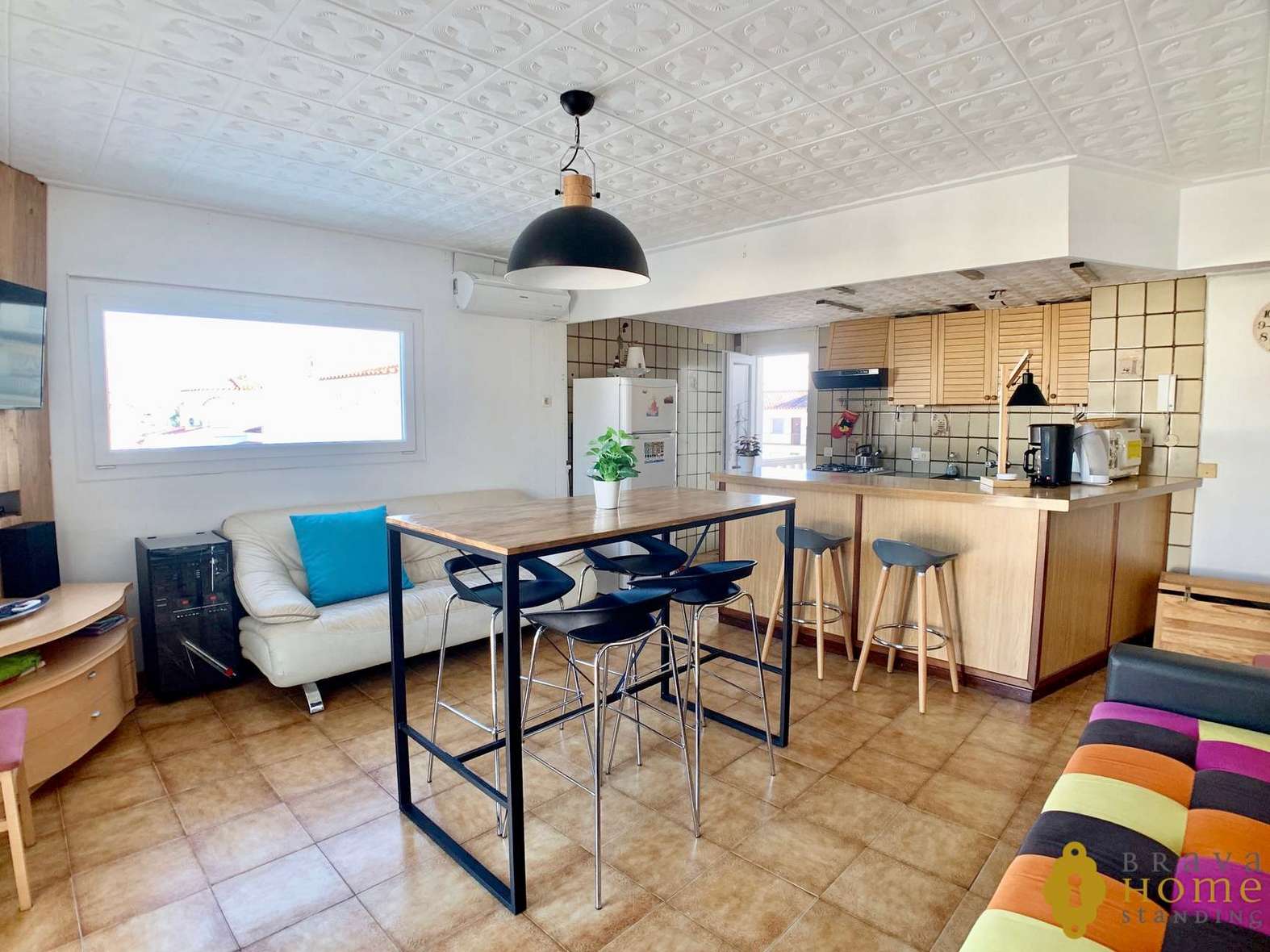 Beautiful apartment with 45m2 terrace and mooring for sale in Empuriabrava