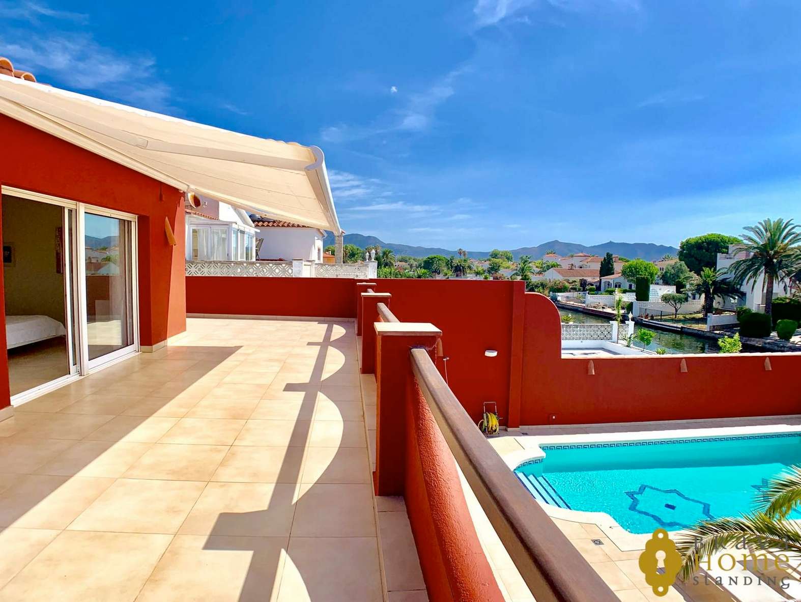 Magnificent villa with mooring on a wide canal and south oriented in Empuriabrava