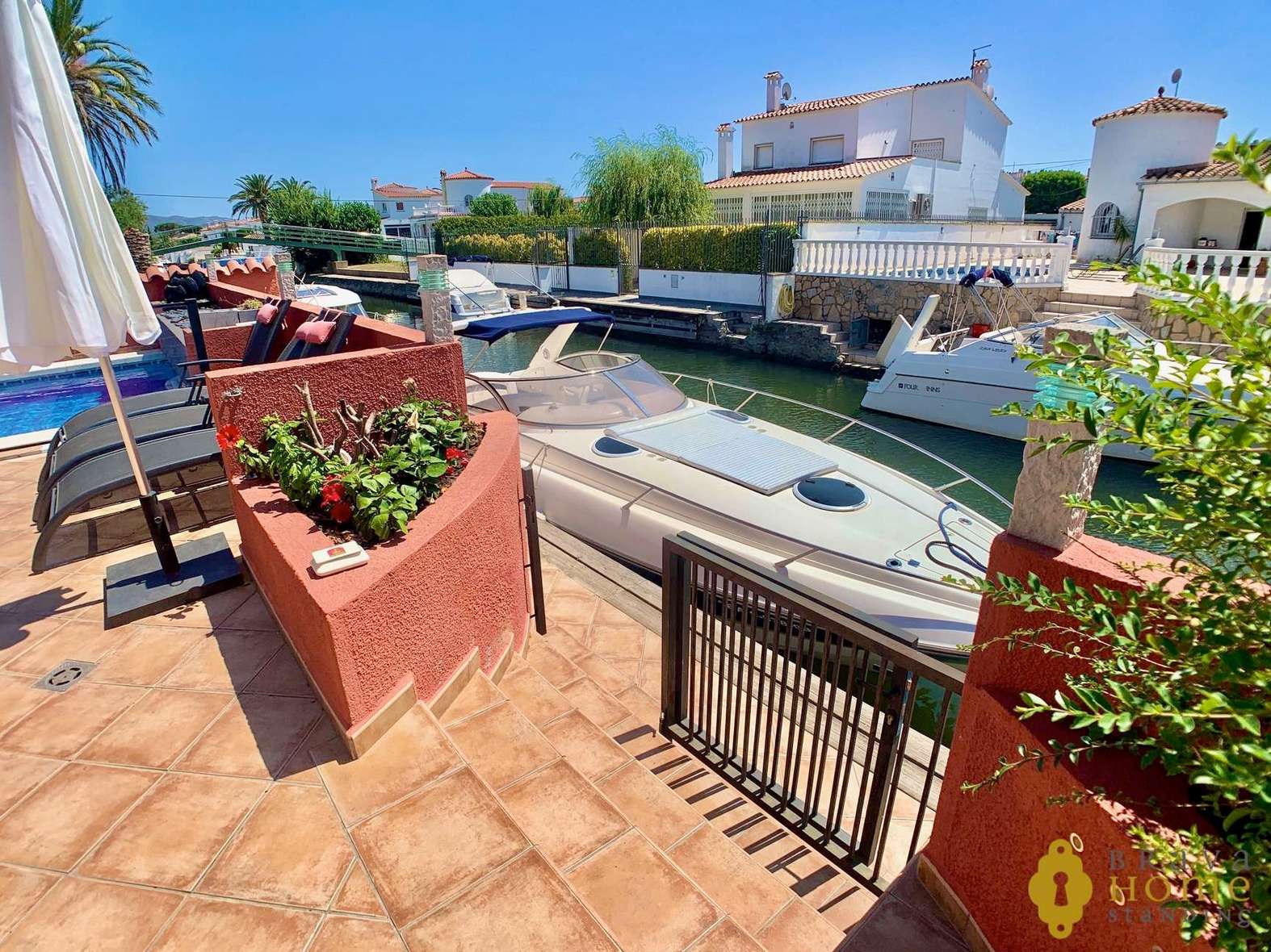 Superb south-facing house with 12,5m mooring for sale in Empuriabrava