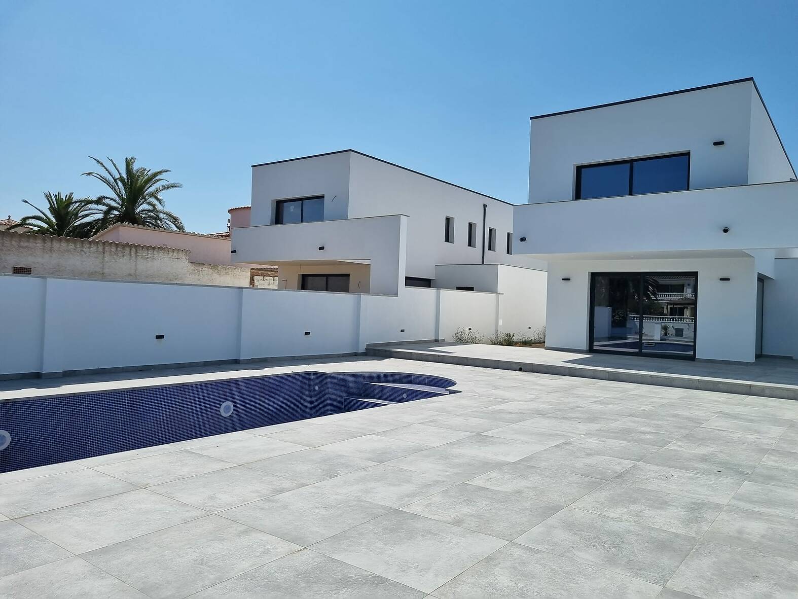 Fantastic newly built villa on a wide canal with mooring for sale in Empuriabrava